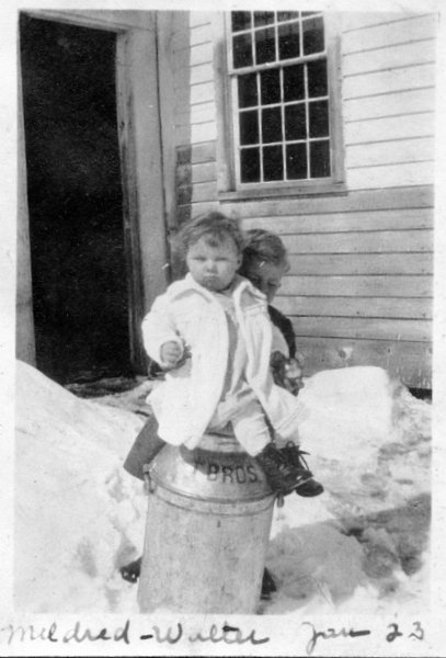 15 Walt & Mom on milk can - Jan 1923