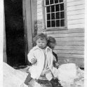15 Walt & Mom on milk can - Jan 1923